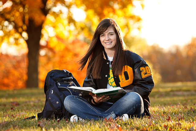 Student laying in Grass