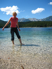 Honors student standing in water