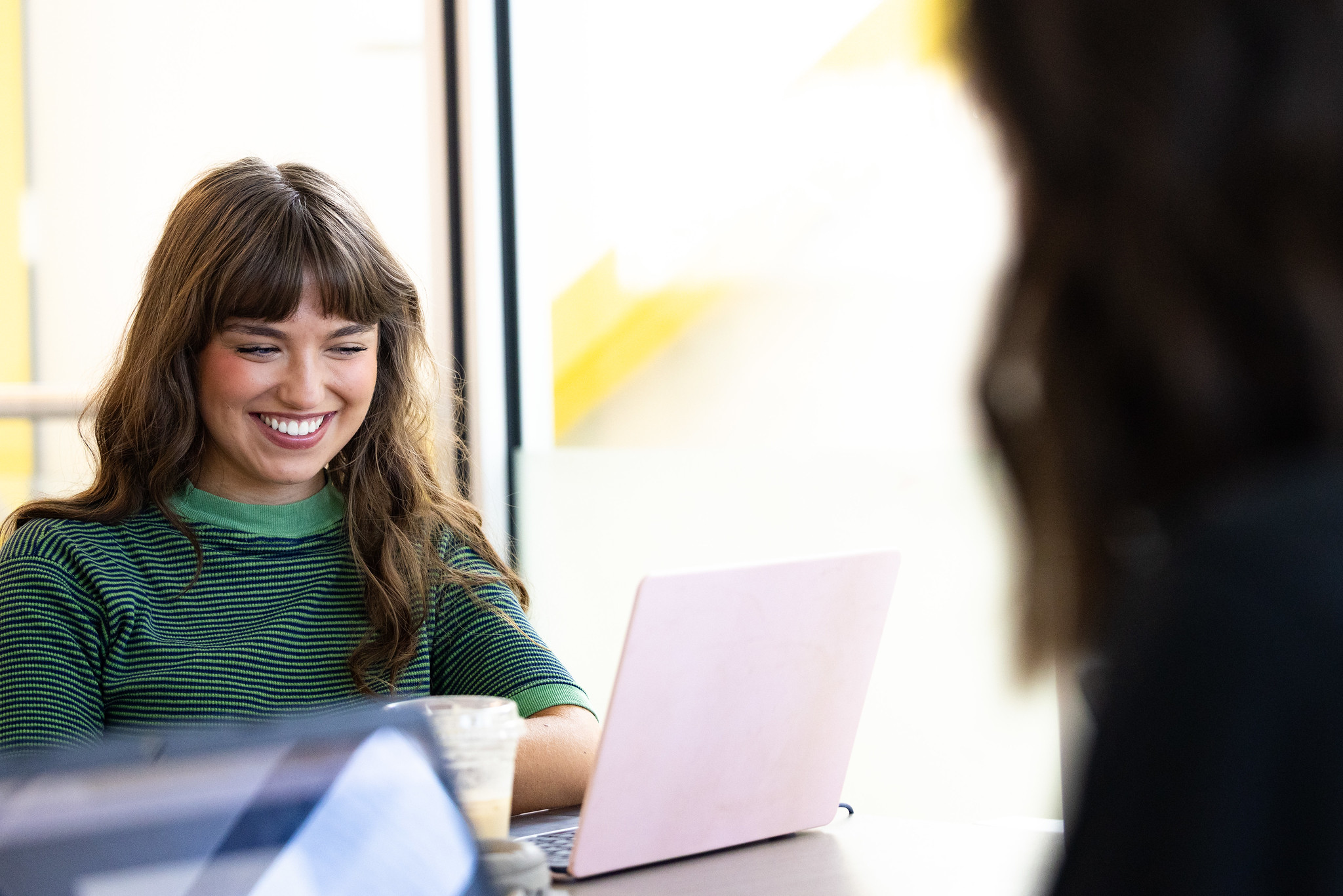 student studying with laptop