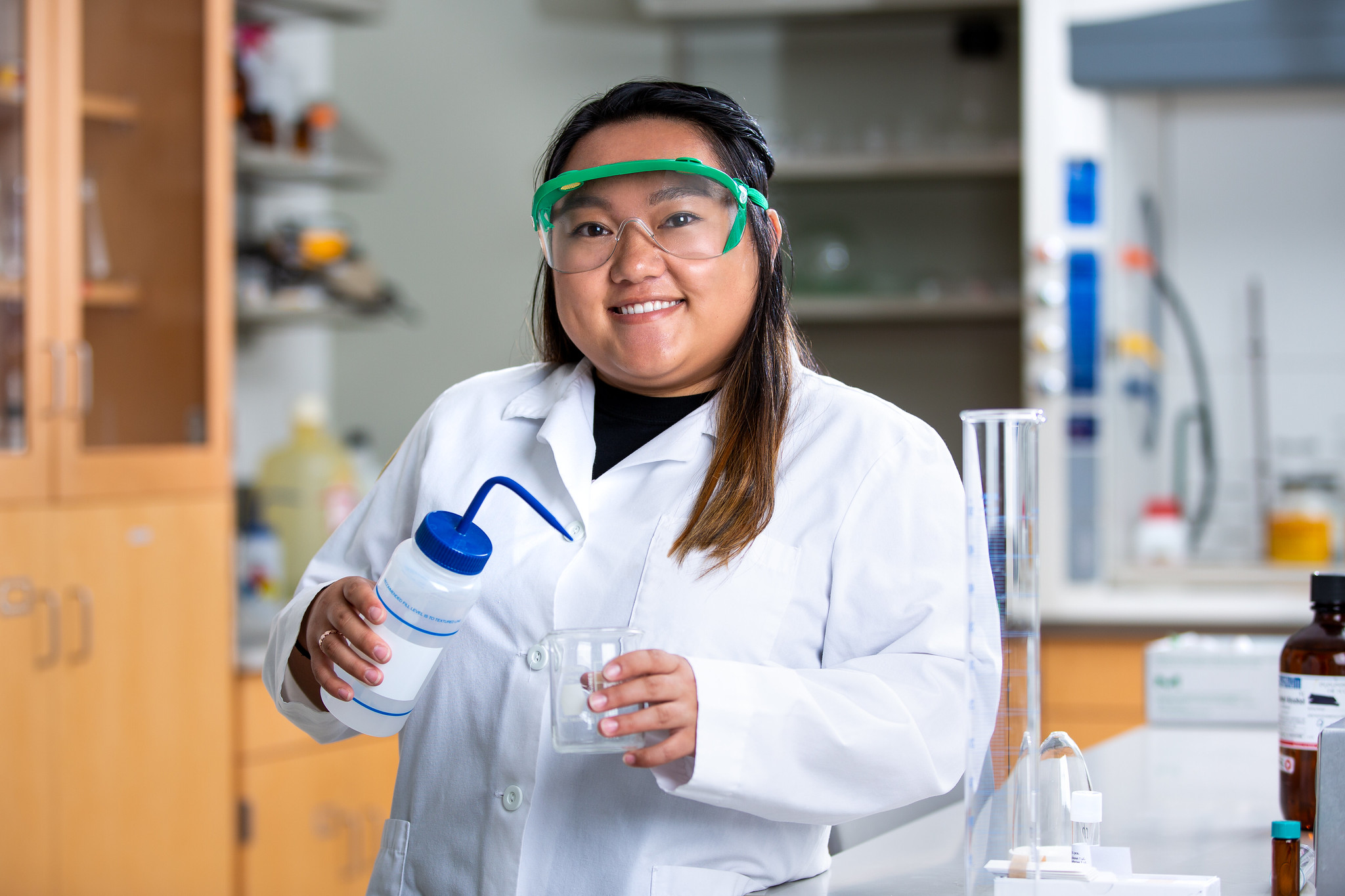 chemistry student working in lab