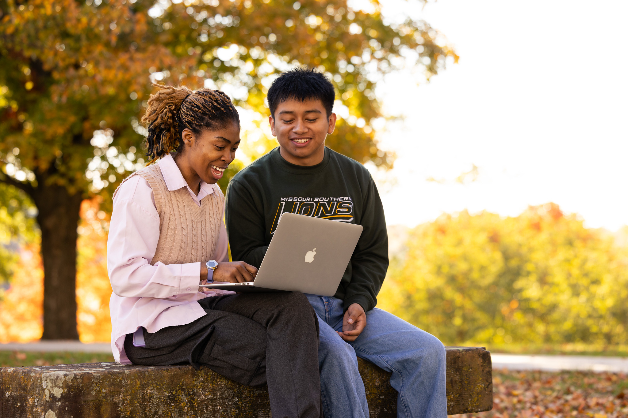 students looking at a computer