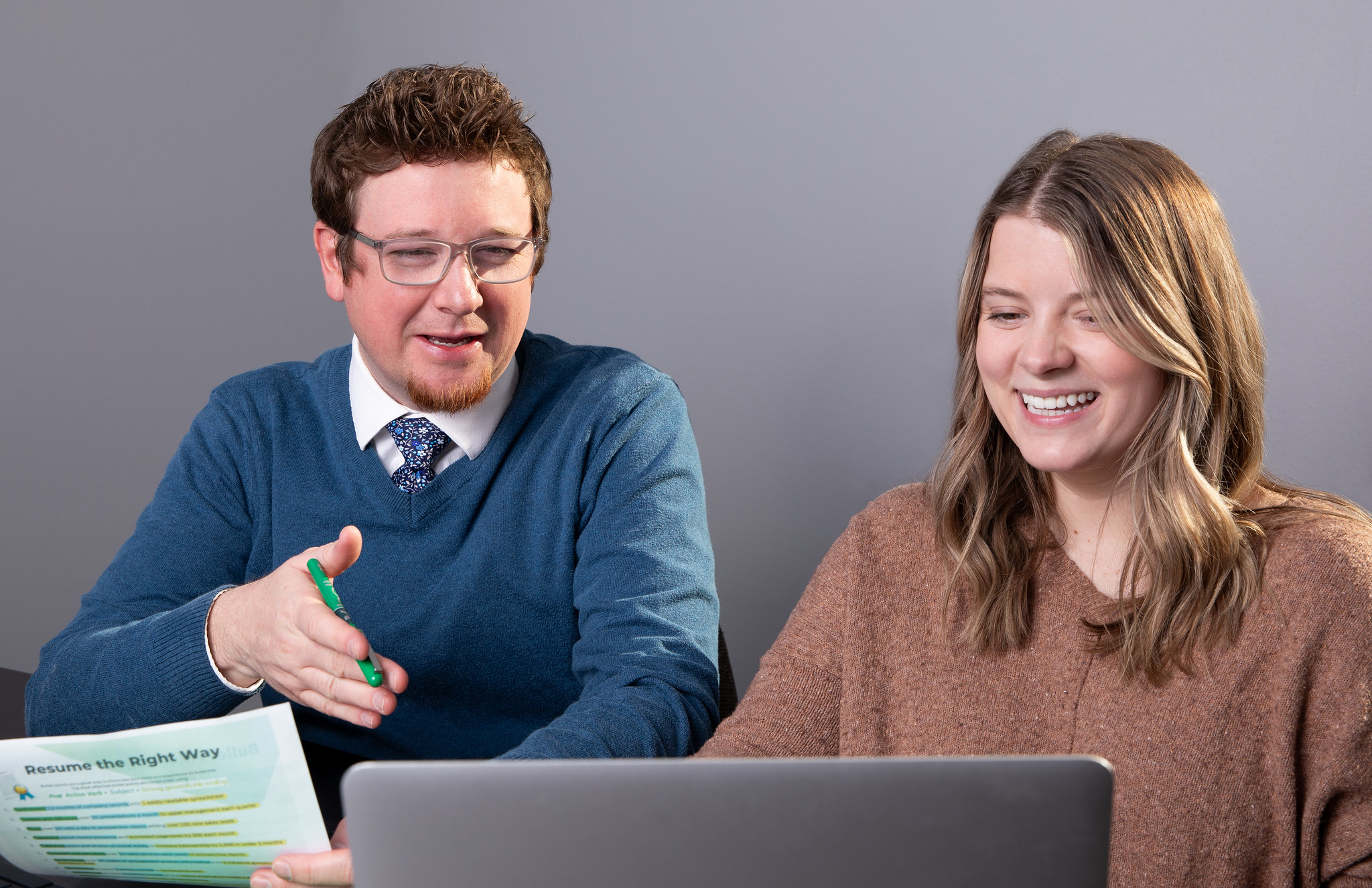 MSSU faculty member and student working at laptop 