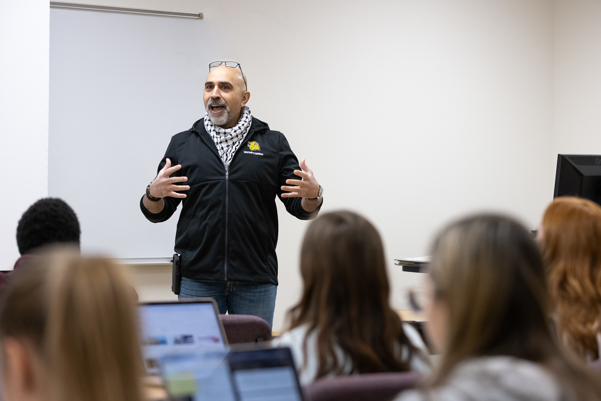 faculty member teaching to class 
