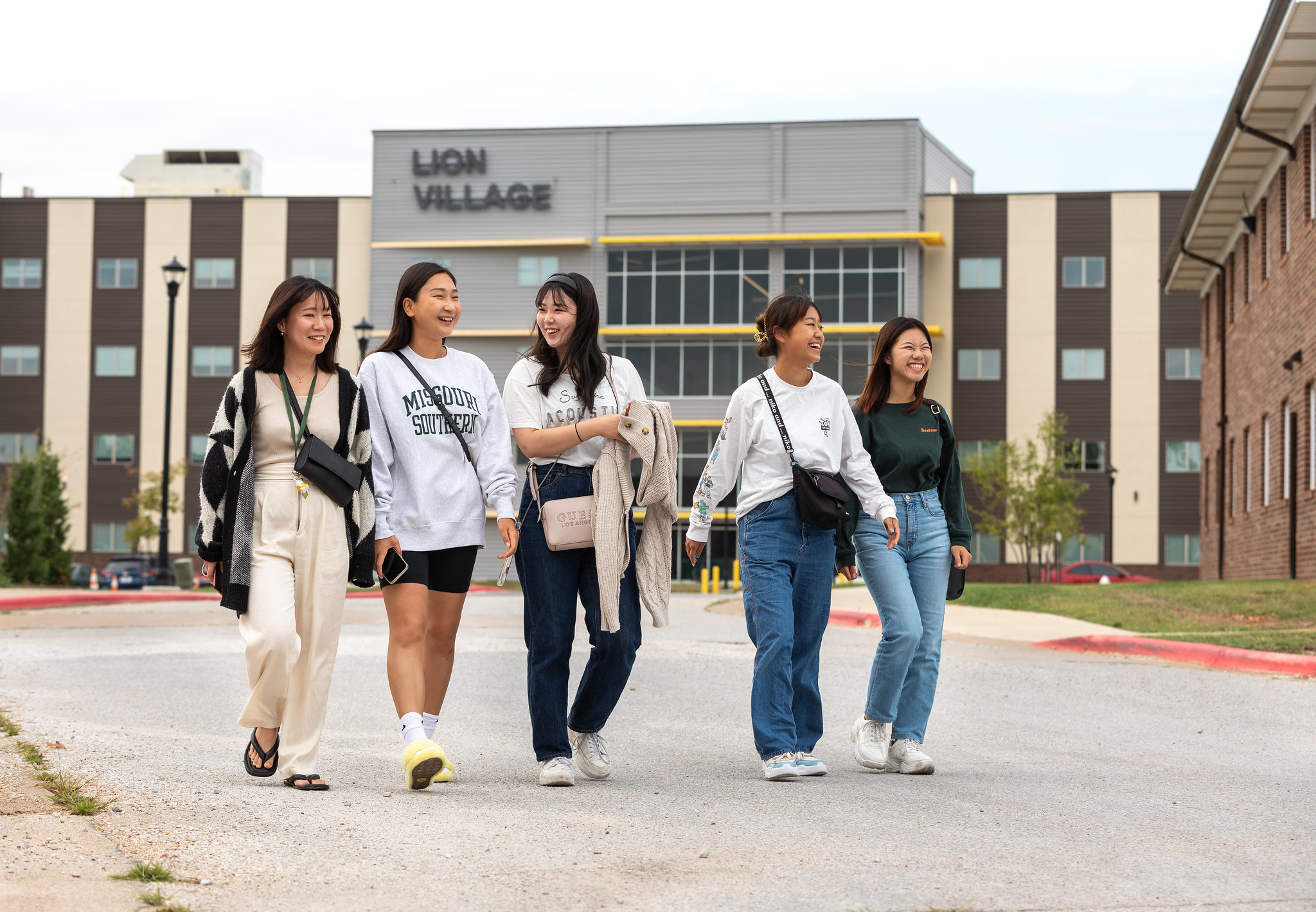 students walking outside on campus 