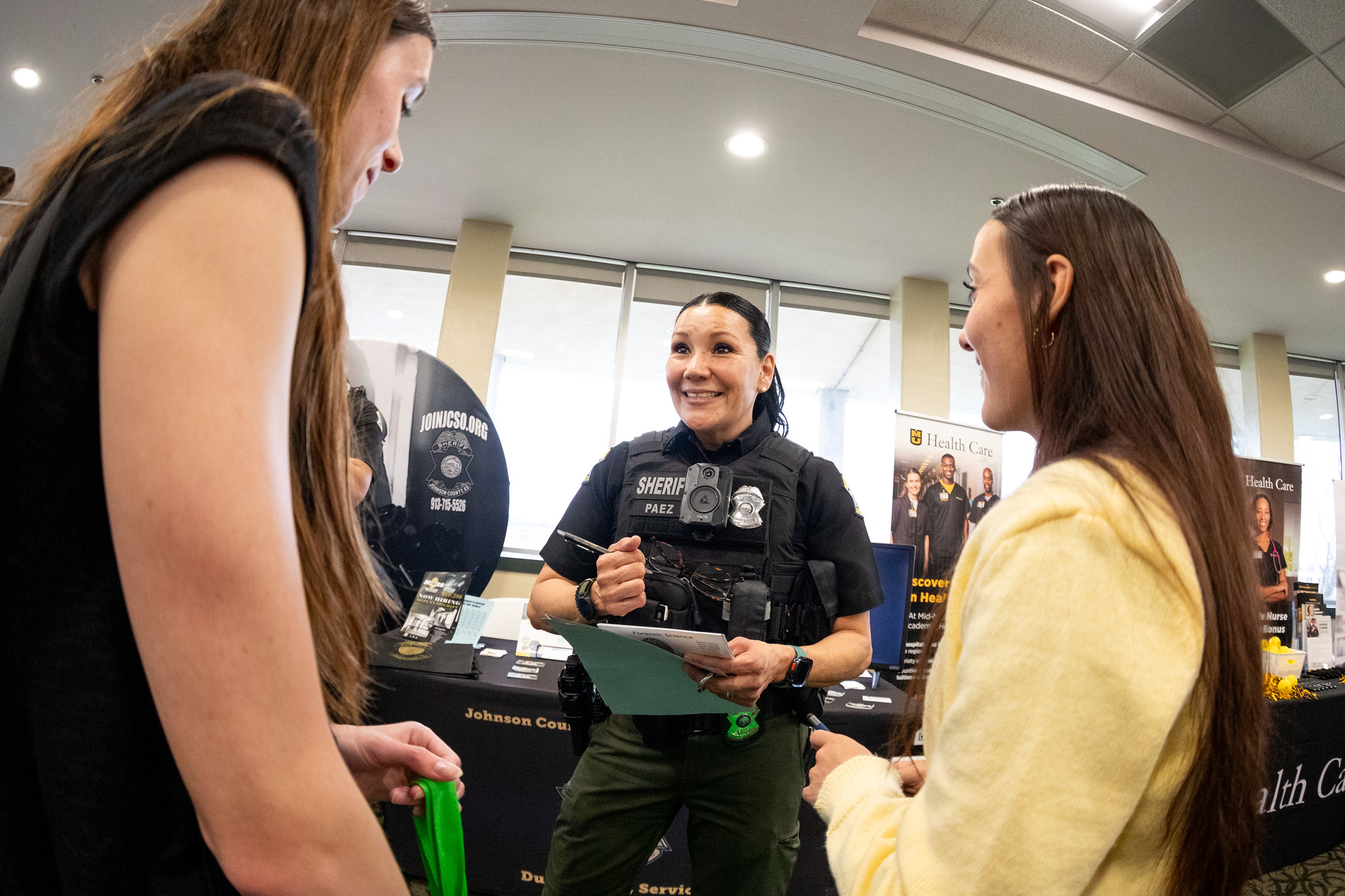 mssu faculty talking to students at table 