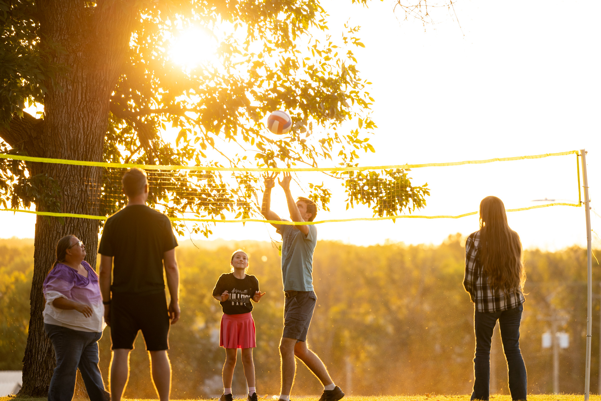 MSSU student and family playing volleyball